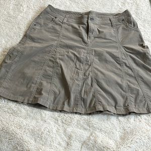 KUHL paneled skirt in khaki, size 14. 68% cotton/ 29% nylon, 3% spandex.